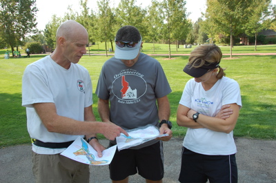 [Bill Leahy discusses route selection with Jeff Decker and Donna Goodwin]